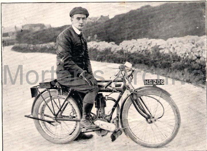 Henry John Scale of his motorcycle