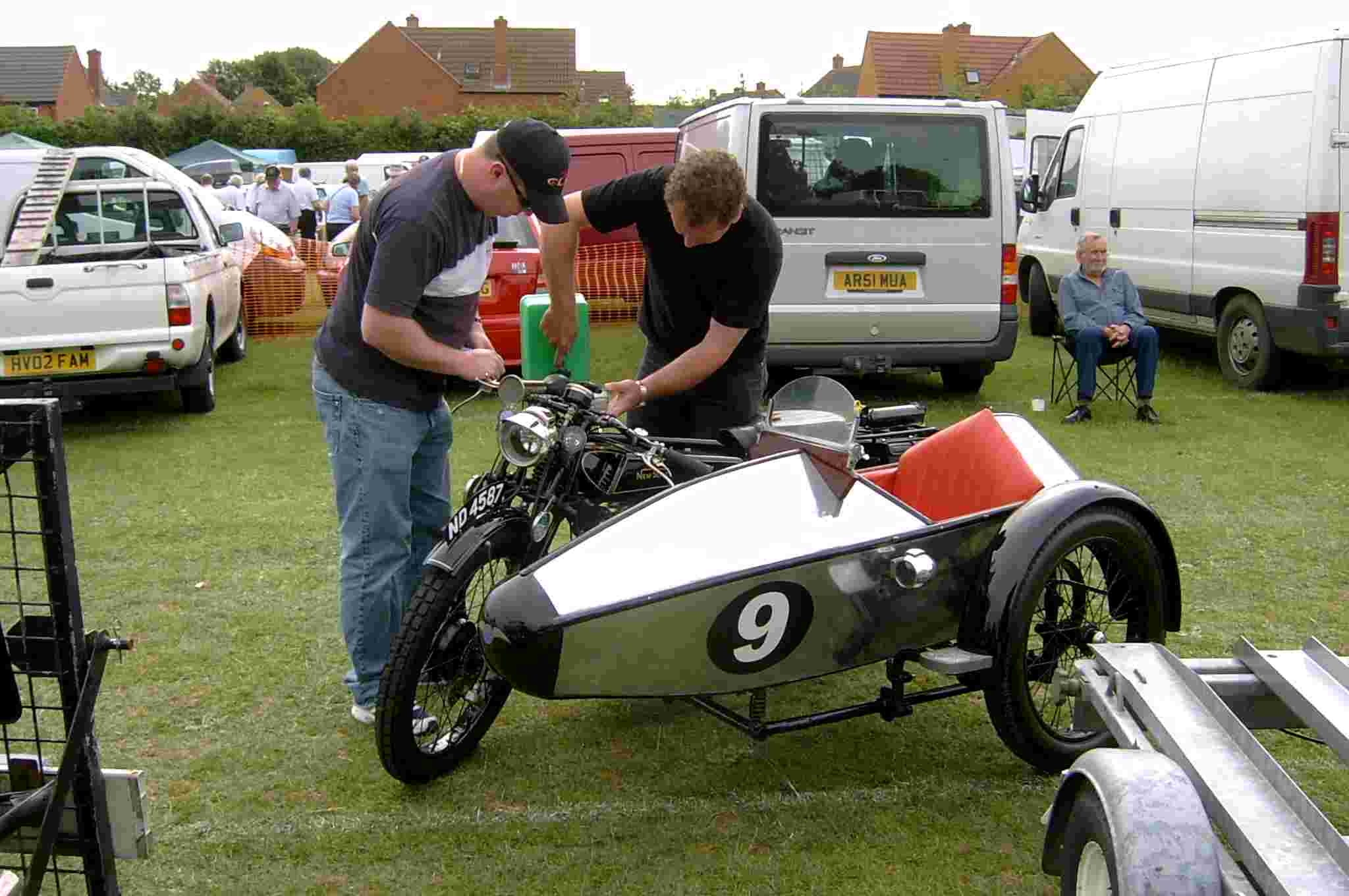 Mark and Matthew Scale repairing the motorcycle