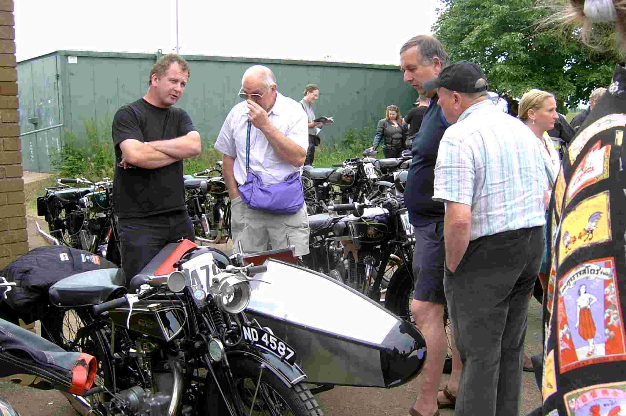 Visitors viewing the New Scale motorcycle and Sidecar