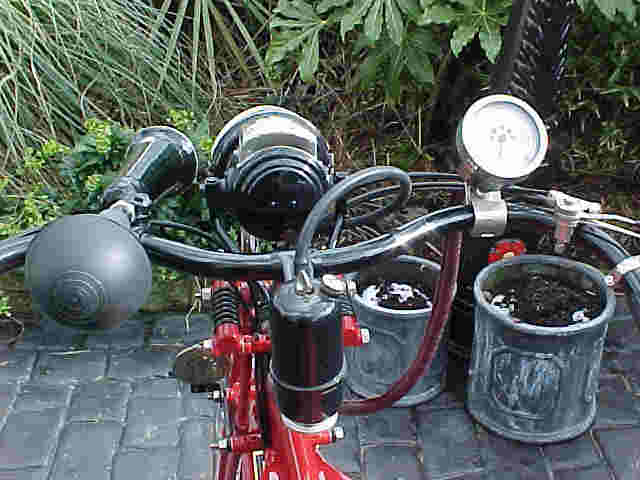 Cowly speedo and Lucas King of the Road carbide lamp