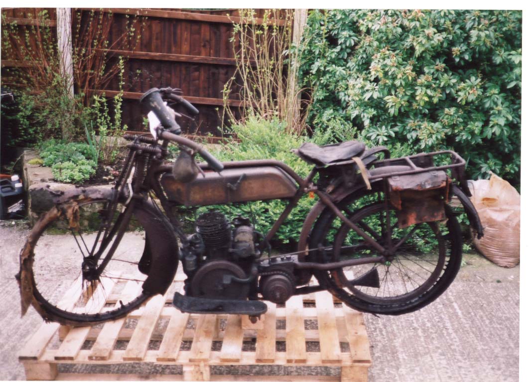 Photograph of the condition of 1921 New Scale motorcycle when first found